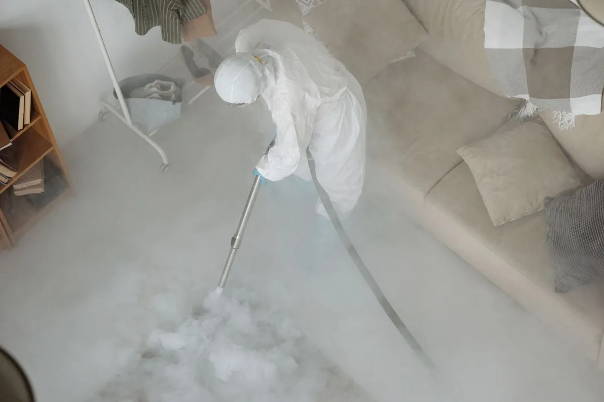 Biohazard cleanup technician in protective equipment, Kenwood, CA